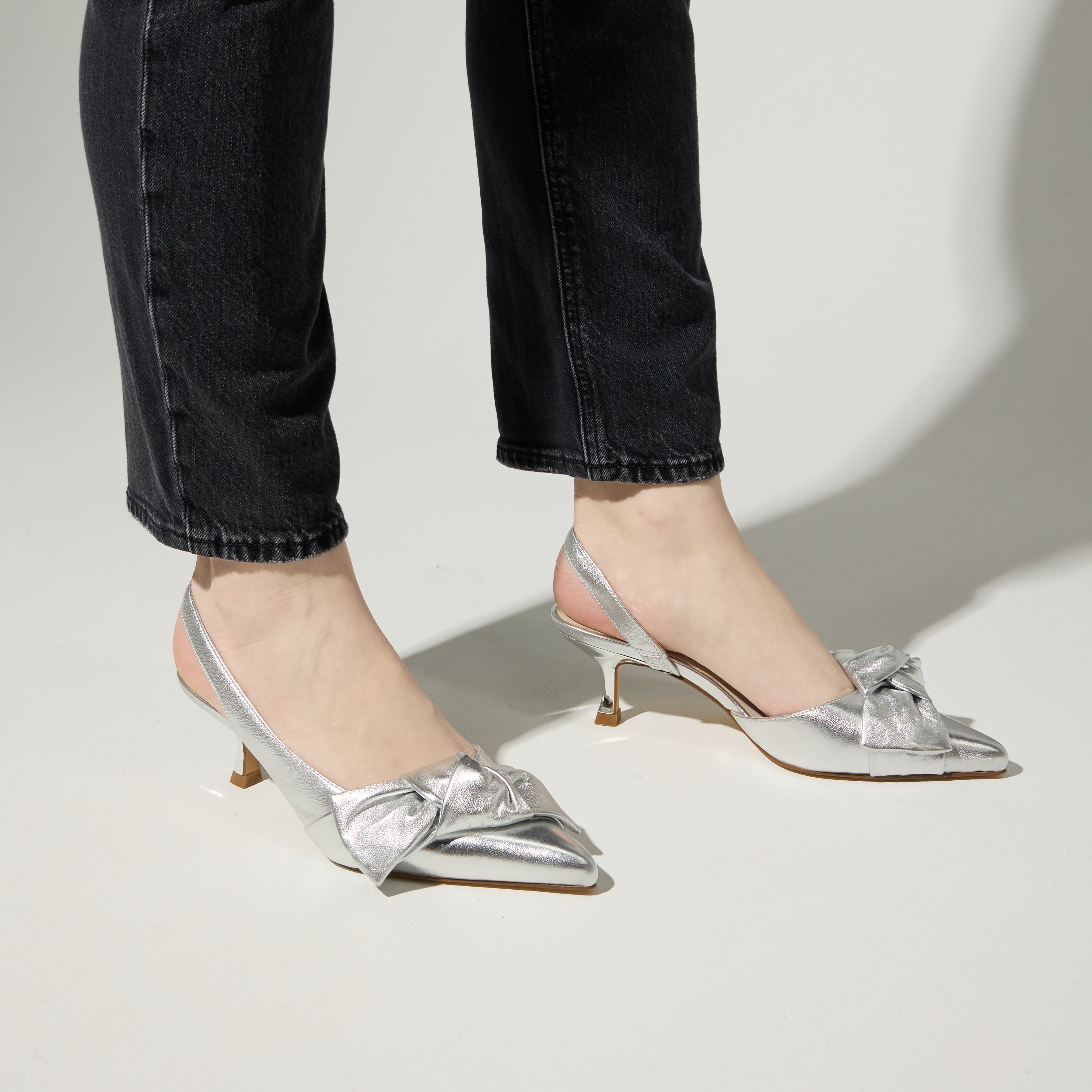 Kaleigh Bow Heel in Silver Leather