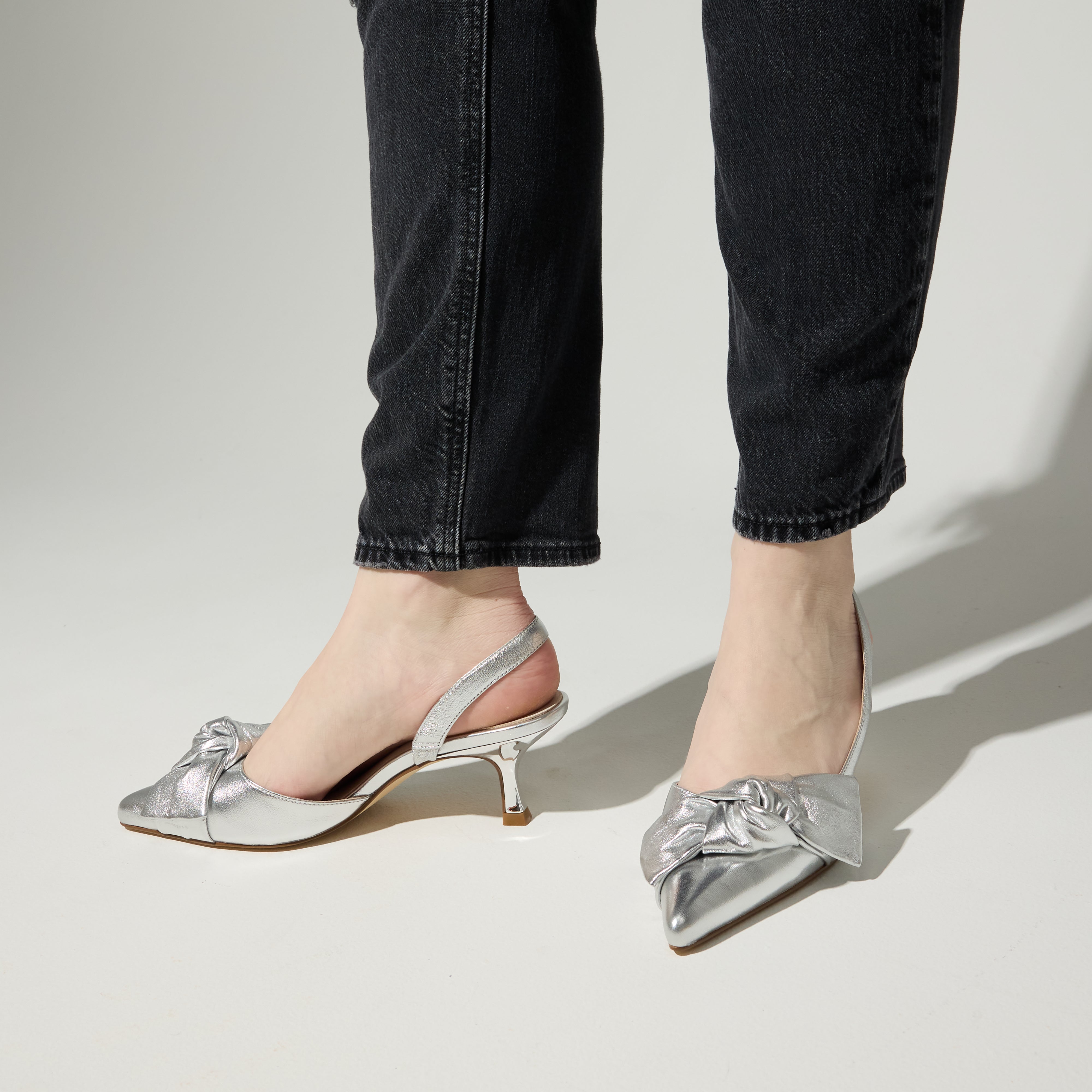 Kaleigh Bow Heel in Silver Leather