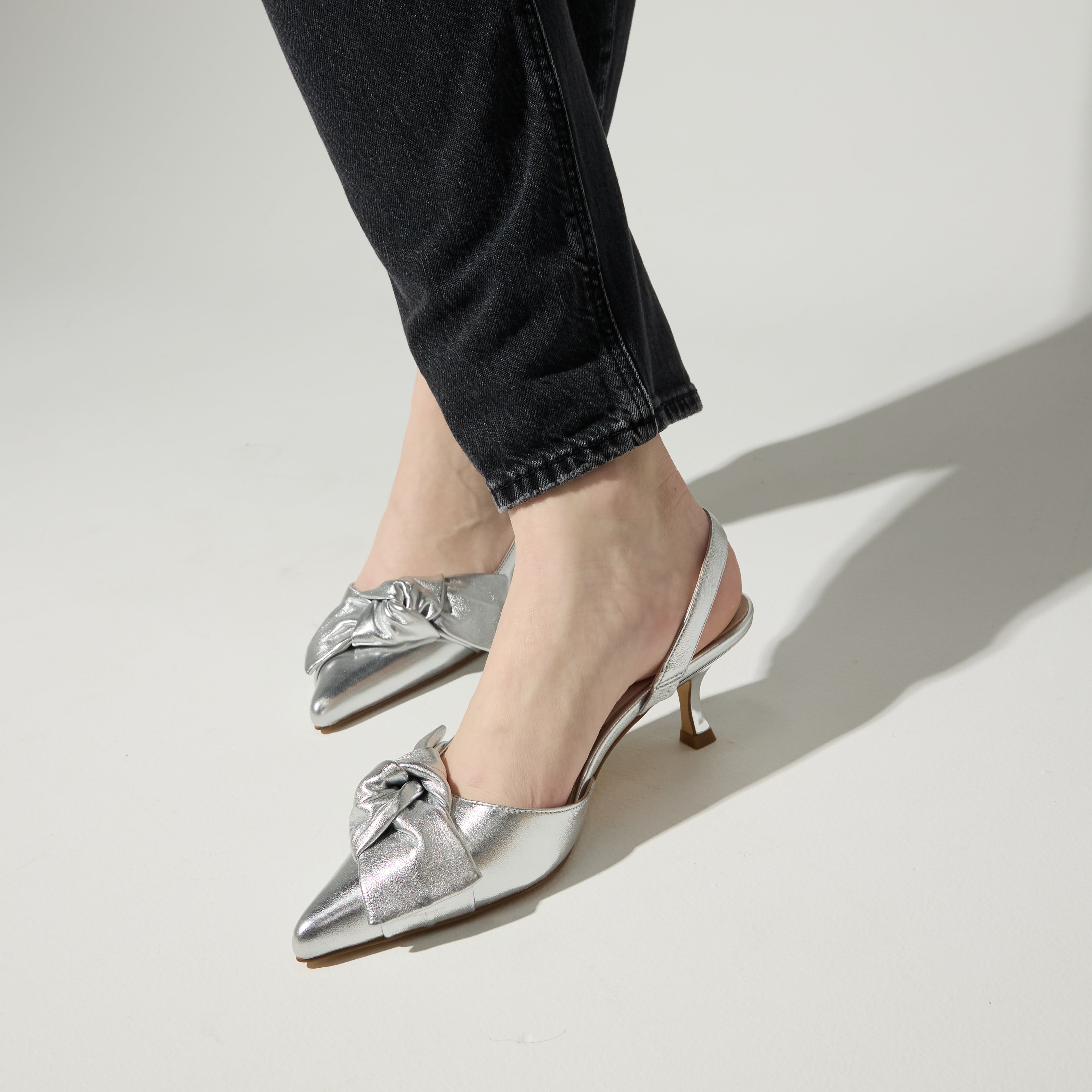 Kaleigh Bow Heel in Silver Leather